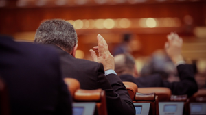 Member of a parliament voting in a show of hands
