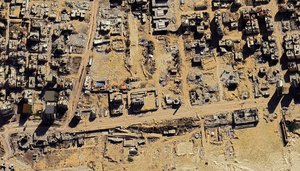 Photograph of an aerial view of war damage in Gaza