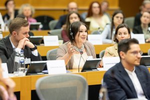 A representative from Ukraine's parliament takes the floor in an interparliamentary meeting at the European Parliament.