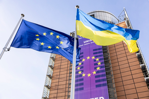 The European and Ukrainian flags raised in front of the European Commission's Berlaymont building in Brussels