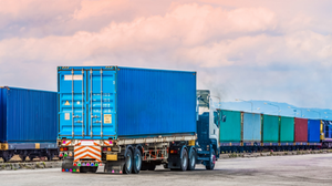Freight car trailer with cargo container and freight train with cargo containers background, import export business logistic, Auto or automobile business commercial background concept.
