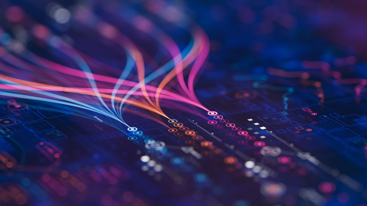 Photograph of colourful and futuristic lines of code on a screen.