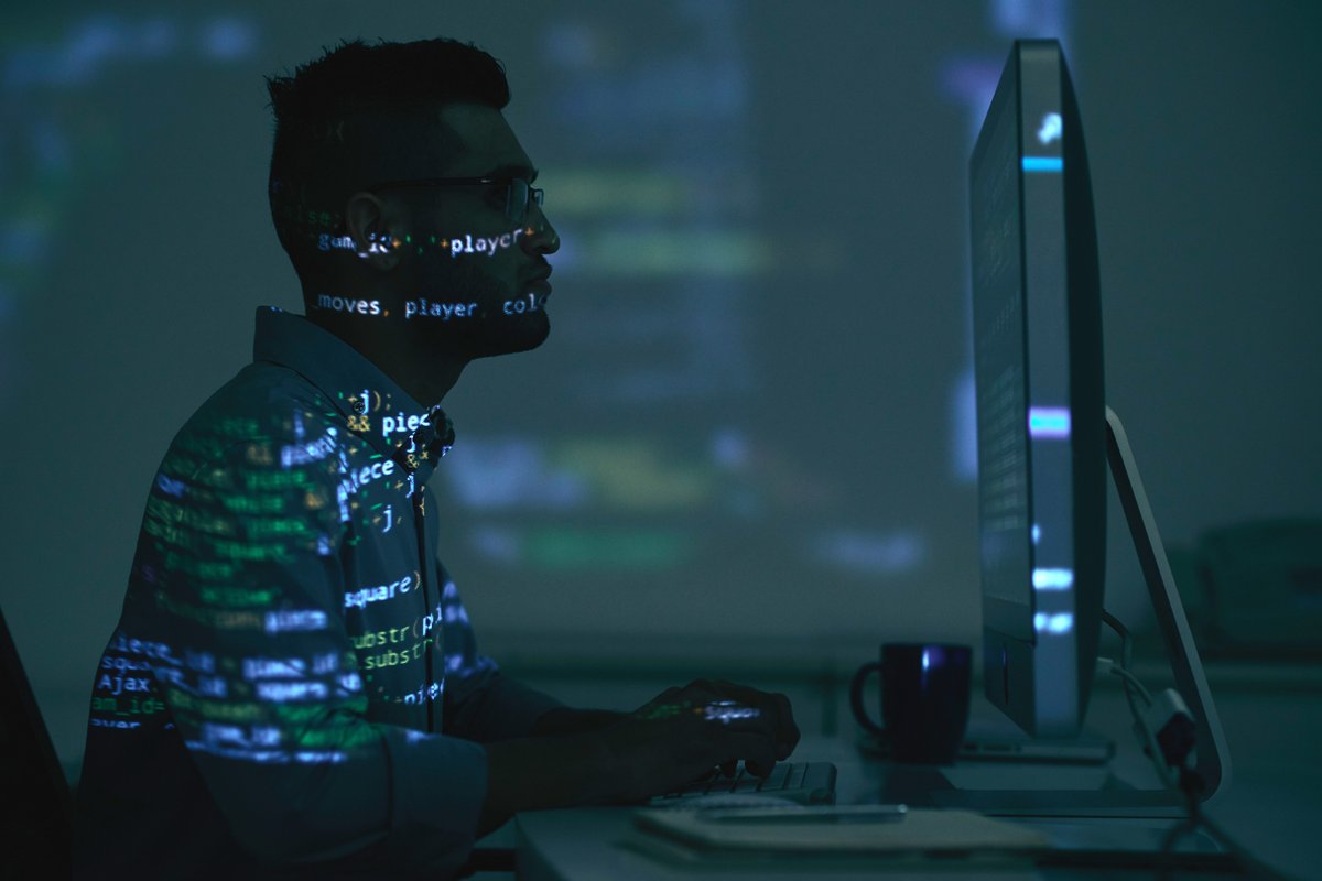 Software developer working on computer
